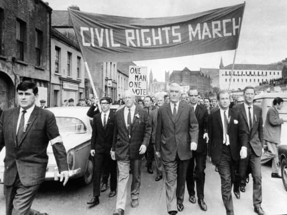 The then leader of the Nationalist Party, Eddie McAteer, leading the October 5, 1968, civil rights march up Duke Street.