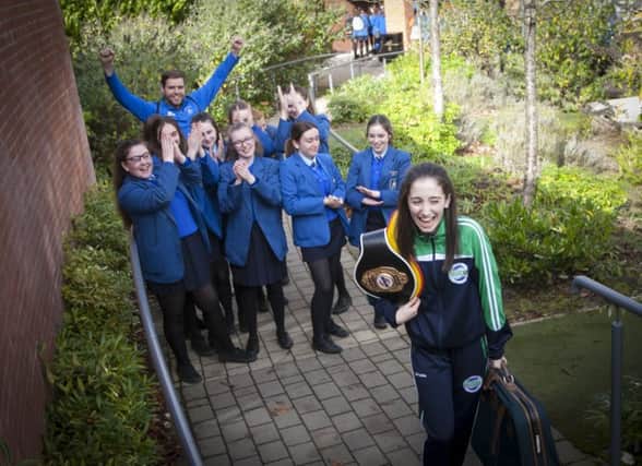 St. Mary's College Year 11 student Caitlin Toland pictured being cheered off by fellow students and Mr. Declan Sweeney ahead of her journey to the WKU World Championships in Athens, Greece next week. (Photo: Jim McCafferty Photography)