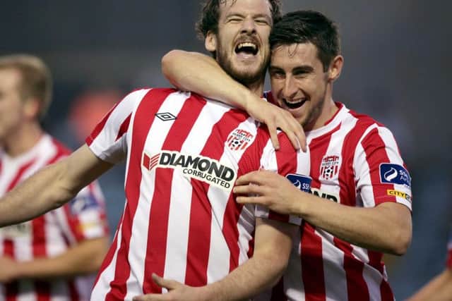 Aaron Barry celebrates with the late Ryan McBride