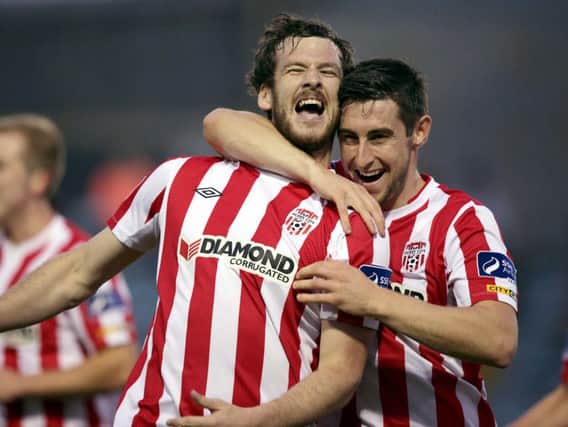 Aaron Barry celebrates with the late Ryan McBride