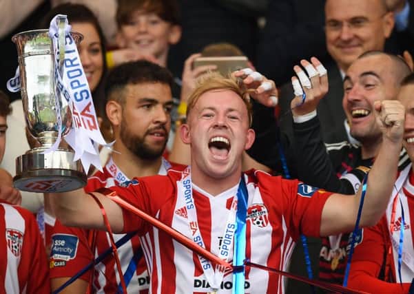 Nicky Low celebrates trophy success with Derry City. Pic by Sportsfile.