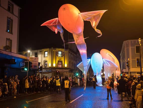 The Derry Hallowe'en street carnival parade makes its way through the city on Wednesday evening.