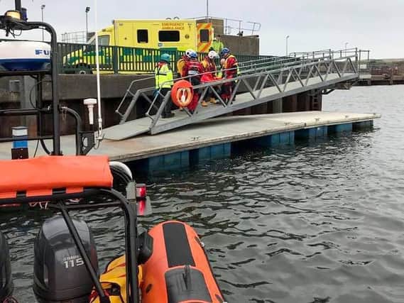 The injured woman was taken by the RNLI to Ballycastle Harbour where was met by an ambulance.
