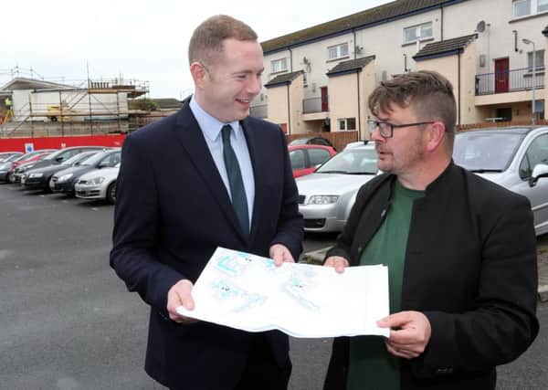 The then Infrastructure Minister Chris Hazzard speaking to Colm Barton, Bogside & Brandywell Initiative during a visit to the Bogside, Derry, to announce details of the new Residents' Parking Scheme back in July 2016. (Photo Lorcan Doherty Photography)