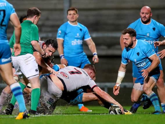 Ulster's Marcus Rea goes over for a try