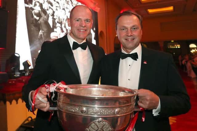 Anthony Tohill and Cork player Tony Davis.