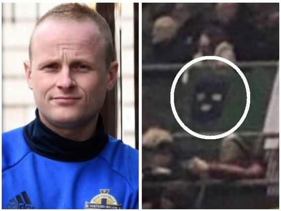 Jamie Bryson and the image of the Munster flag he mistook for what he described as a "masked terrorist".