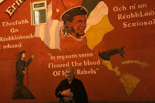 Dr. Aleida Guevara at the mural in honour of her father in the Bogside.