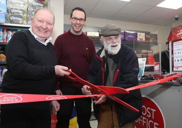 Local pensioner Joe Doherty, cutting the tape to officially open the new Post Office at Gills Newsagents & Spar, Park Avenue, Rosemount. Included are John Gill, proprietor, and Kevin Gill, Post Master.