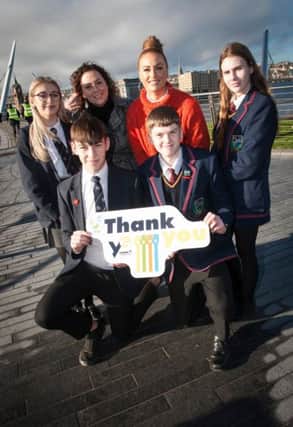 Mentors Aoife Doherty, owner, Sass and Halo and Lynn Jennings, owner, Talent Social pictured at the city'"s Peace Bridge with students from Lisneal and Oakgrove Integrated colleges. Included are Alex Boyd, Lauren Whiteside, Niamh Hawes and Conor Bratton.