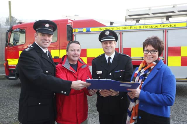 A Road Safety Agreement, delivering an education programme by emergency services, has been put in place between Magilligan Prison and Northern Ireland Fire and Rescue Service. Pictured signing the Agreement are District Commander Andrew Russell, NIFRS, Richard Taylor, Magilligan Prison Governor, Gerry Lennon, Group Commander, Northern Ireland Fire & Rescue Service, and Magilligan Prison Governor Adele Norton.