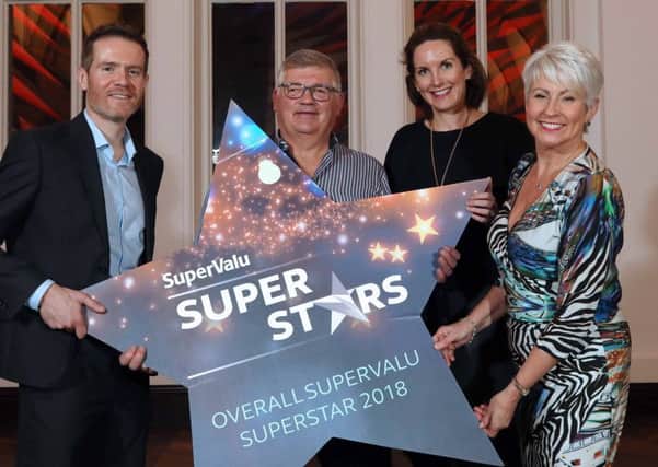 Andrew Smyth from Dungiven was awarded the title of overall SuperValu Action Cancer SuperStar 2018, as well as receiving the Fundraising SuperStar award at a glittering awards ceremony at Titanic Hotel, which recognised over 30 inspirational individuals from across Northern Ireland. Andrew received a Â£1000 cash prize and a Â£1000 donation to his chosen charity. Pictured (L-R): Brendan Gallen, Head of Marketing, Musgrave; Andrew Smyth, overall winner SuperValu Action Cancer SuperStar 2018; Ciara McClafferty, Trading Director, Musgrave; and host Pamela Ballantine.