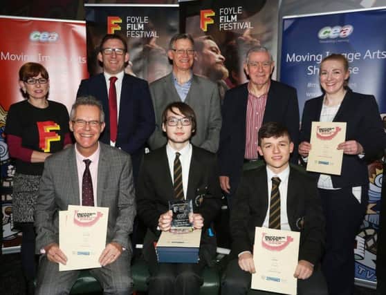 Left to right: BACK ROW - Bernie McLaughlin, Director of Foyle Film Festival; Justin Edwards, CCEA Chief Executive; Bernard McCloskey, Head of Education at Northern Ireland Screen; Michael Bond, Event Sponser from City of Crystal Derry; Orla Gallagher receiving 3rd place certificate in AS Best Animated Film Category on behalf of Jack Foley from St Columbs College; FRONT ROW  Colum Meyler receiving Joint 3rd place certificates in the A2 Best Film Category, on behalf of Clara McHugh and OisÃ­n-TomÃ¡s " Raghallaigh; First place winner in GCSE Best Animated Film Category, Ciaran Patton and 2nd place in GCSE Best Film, Josh Dolan, all students from Holy Cross College, Strabane.