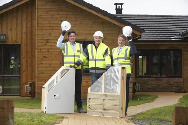 Leading rapid-build home manufacturer FastHouse announced the completion of its contract to provide and erect the timber frames for 466 lodges at the highly anticipated Center Parcs in Longford. Pictured are Sisk Senior Contracts Manager Cormac Fitzpatrick, Center Parcs Construction and Development Director Paul Kent and  FastHouse Sales and Installations Director Sean Fox. Picture Conor McCabe Photography.