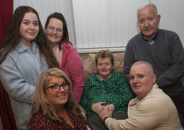 TONY TAYLOR HOME. . . . .Derry Republican Tony Taylor, who was released from Maghaberry on Wednesday, at his parents Creggan home on Wednesday night. He is pictured with his mum and dad Veronica and Willie, wife Lorraine (front), daughter Ellie-Jo and sister Joanne.