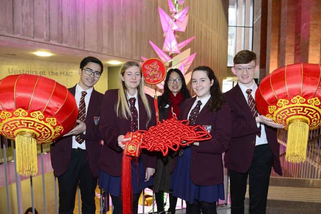 Pupils from Foyle College (from left) Conall Cho Ho Kuan, Sarah Robinson, Hollie Craing and Lindsay Wilson are joined by their Mandarin teacher Hong'e XU