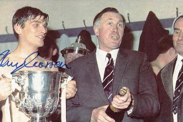 Jobby pictured with the Division Two trophy and City manager, Joe Mercer