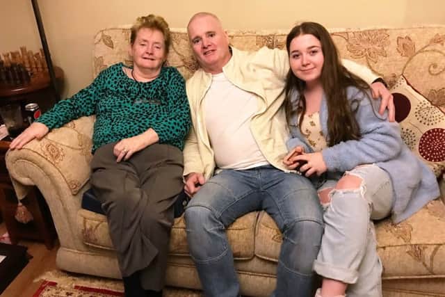 Tony Taylor pictured with his mum and daughter, Ellie-Jo.