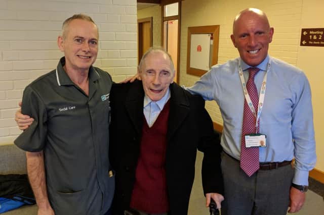 William Sharkey, centre, with John Magee, Care Assistant, William Street Residential Home and Dr Bob Brown, Western Trust Director of Primary Care & Older Peoples Services.