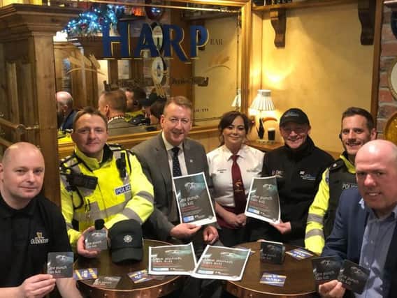 Kevin Daly, owner of the newly opened Harp Bar in Waterloo Street with Sergeant Dermot Butler, Jim Roddy (City Centre Initiative), Harp Bar staff member, Dermot McCrossan, City Centre Ranger, Constable Eddie Murphy and Dermot Harrigan, Derry and Strabane PCSP at the launch of the One Punch Campaign.