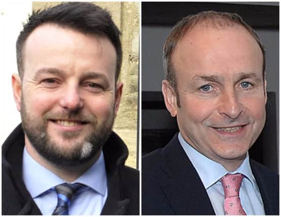 Formal talks.... SDLP party leader Colum Eastwood and Fianna Fail party leader Micheal Martin.