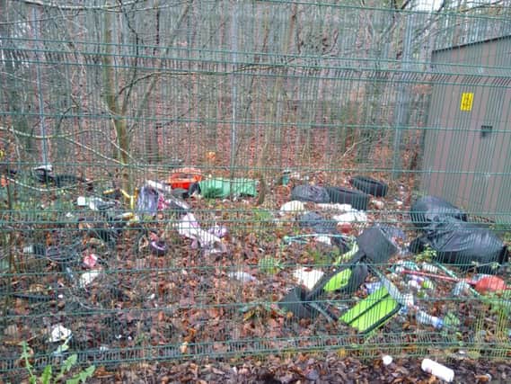 The illegal dumping next to the electricity substation in the Bogside.