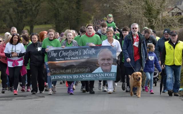 2018... The inaugural Chieftains Walk, in memory of Martin McGuinness, makes its way along Groarty Road towards Grianan of Aileach. DER138GS017