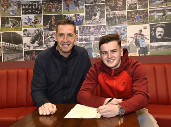 Ex-Birmingham City striker Ronan Hale pictured with manager Stephen Baxter at Seaview after signing for the Shore road side for two and a half years.

Photo by Stephen Hamilton/Presseye