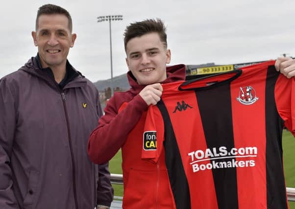 Ronan Hale with Crusaders boss Stephen Baxter following completion of his move. Pic by PressEye Ltd.