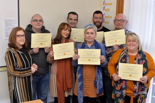 Carmel McElhinney (on the left), tutor with Mind Yourself, pictured with participants who recently received certificates for successfully completing a course on Peer Advocacy Mental Health, sponsored by the CLEAR Project and PHA. From left are Peter Donaghy, Valerie Curran, Martin McLean, Andrea Doherty, Matthew McCracken, John Doran and Michele McCaul. DER0319GS-011