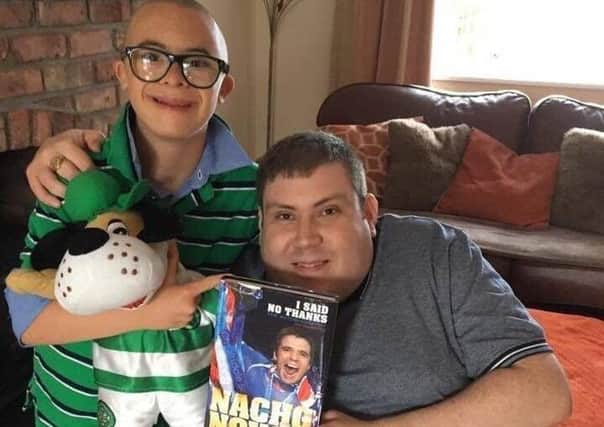Celtic fan Jay Beatty from Lurgan with Rangers fan Tim Webb from Portadown