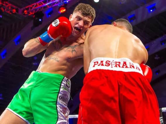 Connor 'The Kid' Coyle delivers a crunching left hook to the body of Danny Pastrana in his last outing.