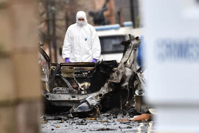 A photograph conveying the aftermath of the car bomb which exploded outside of the Derry courthouse earlier this month.