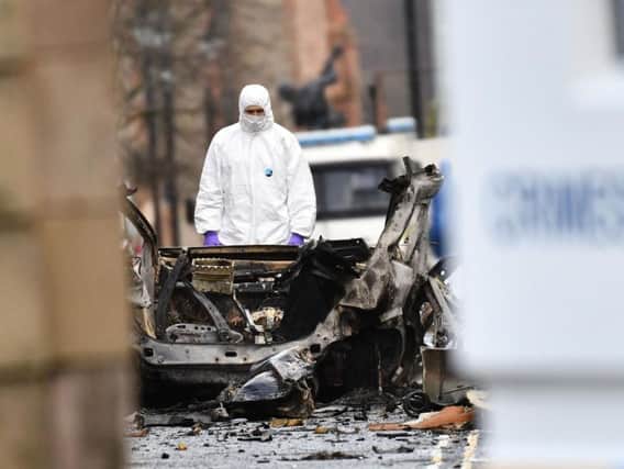 A photograph conveying the aftermath of the car bomb which exploded outside of the Derry courthouse earlier this month.