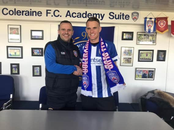 Coleraine manager Rodney McAree welcomes new signing Dean Shiels to the club.