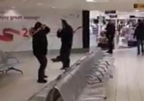 An image taken from the video footage of the fight between a group of men in Belfast International Airport on Saturday.