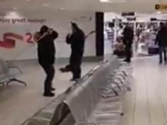 An image taken from the video footage of the fight between a group of men in Belfast International Airport on Saturday.