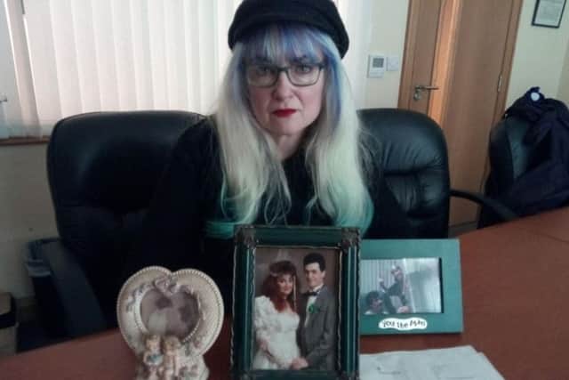 Constance Jordan, who has vowed to fight against her deportation to the US, with pictures of her late husband Martin and her late son Andrew. Also pictured is the recent letter she received from the UK Visa and Immigration.
