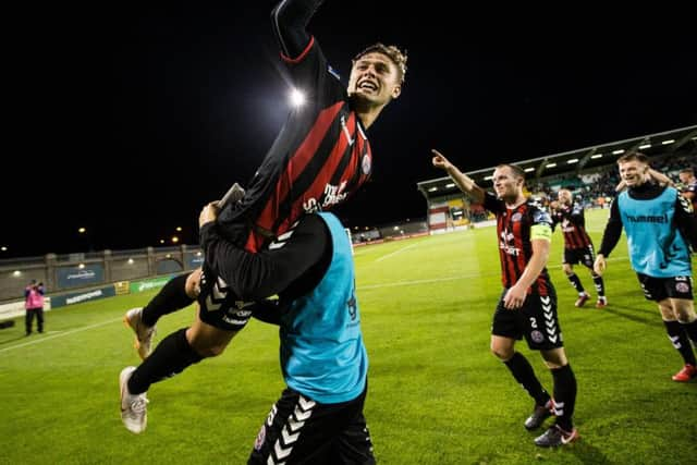 Stokes celebrates his winning goal in the Dublin Derby against Shamrock Rovers last season.