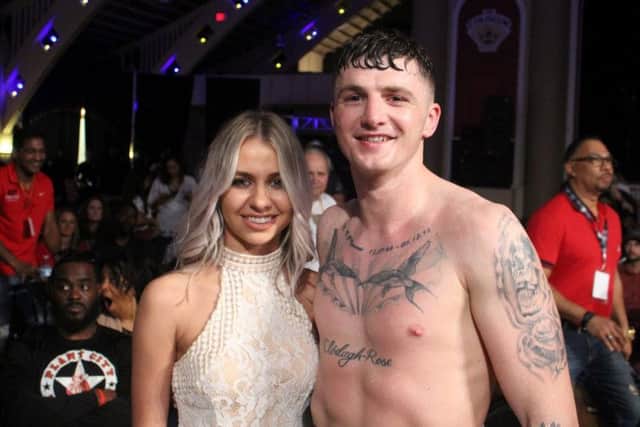 Derry middleweight, Connor Coyle pictured with his girlfriend, Eva after his successful return to the ring in Florida on Saturday night.