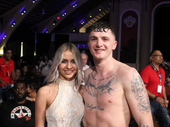 Derry middleweight, Connor Coyle pictured with his girlfriend, Eva after his successful return to the ring in Florida on Saturday night.