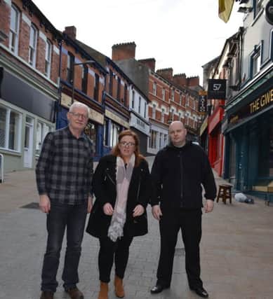 Sinn Féin Councillor Sharon Duddy meeting with local publicans William McGuinness (Gweedore Bar) Kevin Daly (Dungloe Bar) on Waterloo Street.