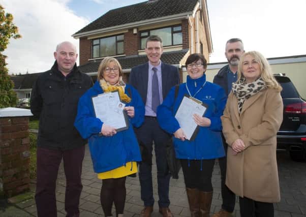 FUEL USE SURVEY. . . . . .The Mayor, Councillor John Boyle (centre), pictured at the launch of the Fuel Use Survey at Greenhaw Road, Derry yesterday afternoon. Survey Interviewers will be knocking on doors across the Council Area in the coming weeks asking householders to take part in the survey. Included from left are Mark McCrystal, Team Leader, Environmental Health, DCSDC, Minty Thompson and Mary McBrearty, Data Collectors/Survey Interviewers, Social Capital North West, Rory McParland and Ciara Ferguson, Social Capital North West.