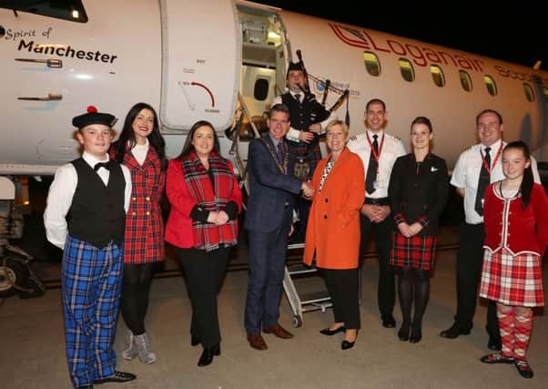 Kay Ryan, Loganair's commercial director, pictured with Mayor of Derry City and Strabane District Council, Cllr John Boyle, Charlene Shongo, Airport Manager for City of Derry Airport and crew.