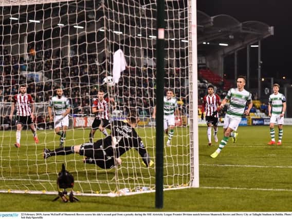 Aaron McEneff turns away to celebrate after his cheeky penalty ends up in the back of the net.