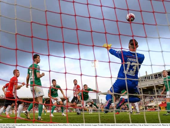 Cork City goalkeeper Peter Cherrie saves a header from Gavin Peers of Derry City during the SSE Airtricity League Premier Division match between Cork City and Derry City at Turner's Cross last year,
