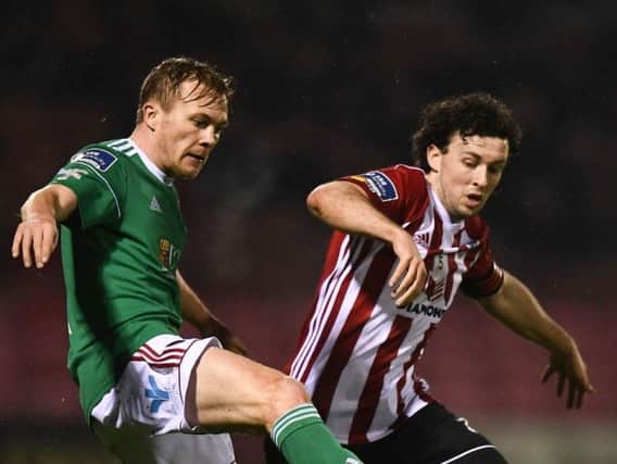 Cork City's Conor McCormack tussles with Derry City skipper Barry McNamee.