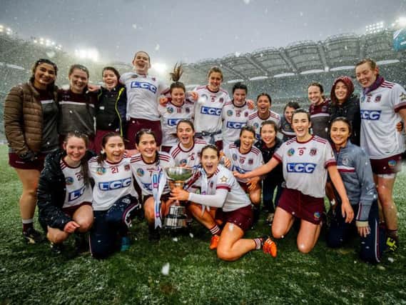 Slaughtneil celebrate with the trophy after the AIB All-Ireland Senior Camogie Club Championship Final.