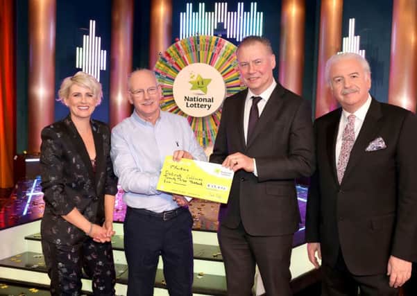 Patrick Collum from Redcastle, Co. Donegal has won 23,000 euro on last Saturday's National Lottery Winning Streak Game Show on RTE. Pictured  at the presentation of the winner's cheques were from left to right:, Winning Streak game show co-host; Sinead Kennedy, Winning Streak Co-Host; Patrick Collum, the winning player; Dermot Griffin, Chief Executive Officer at the National lottery and Marty Whelan, Winning Streak Game Show co-host.  The winning ticket was bought from Gala Express, Drung, Quigleys Point, Co. Donegal. Pic: Mac Innes Photography.