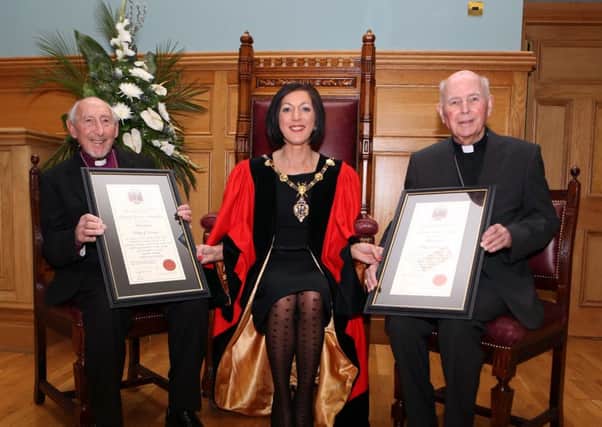 Former Derry Mayor Brenda Stevenson confers the Freedom of the City to Bishops James Mehaffey (left) and Dr Edward Daly back in 2015.